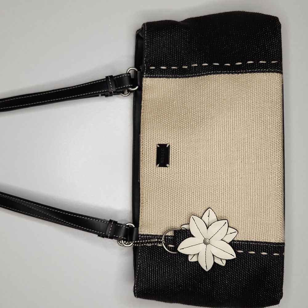 Relic cream and black shoulder bag with floral accessory